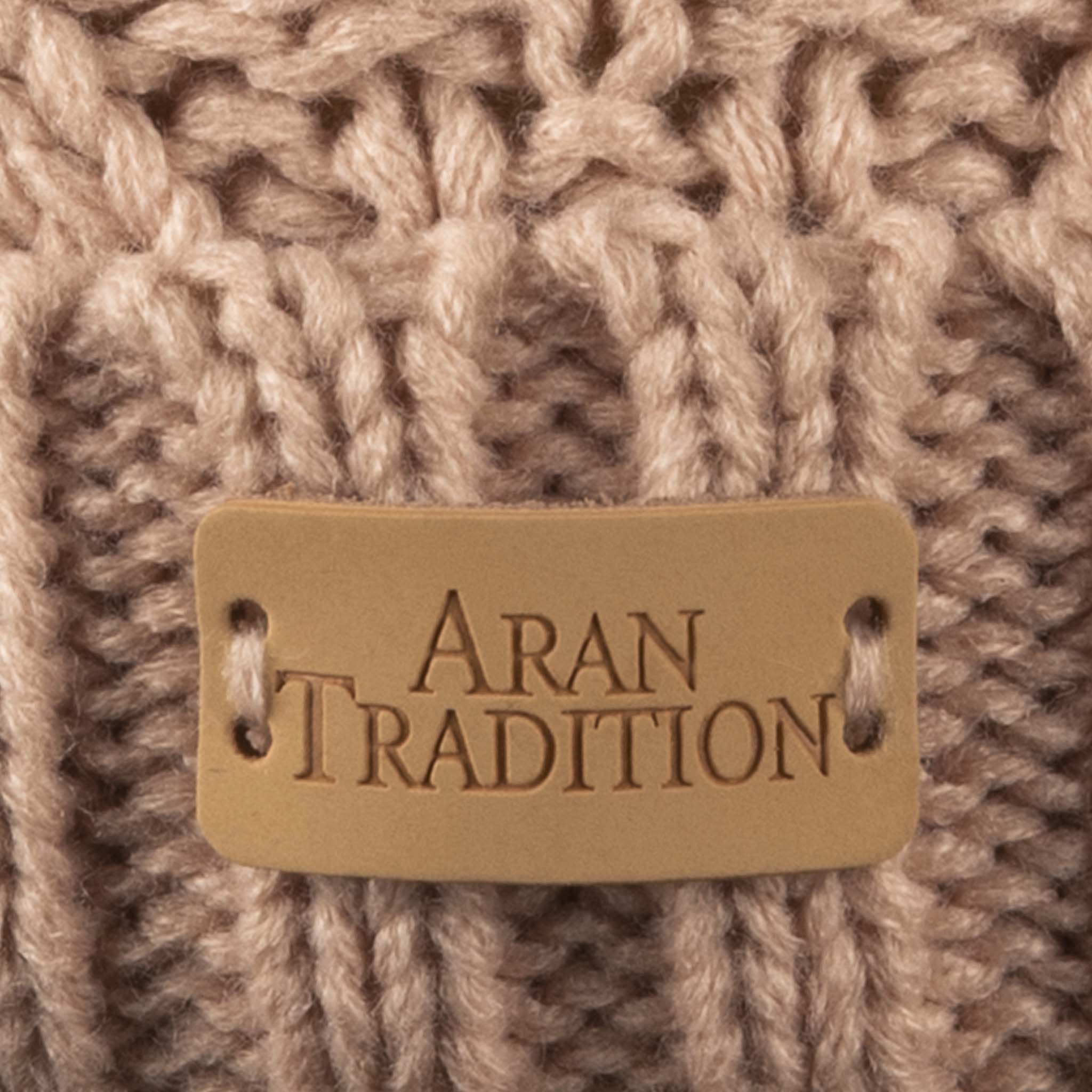 Stay Cozy & Chic with Aran Cable Pom Pom Hat | Traditional Cable Knit