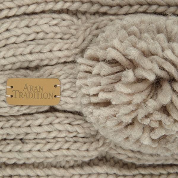 Elevate Your Winter Style with Aran Cable Knit Pom Pom Scarf